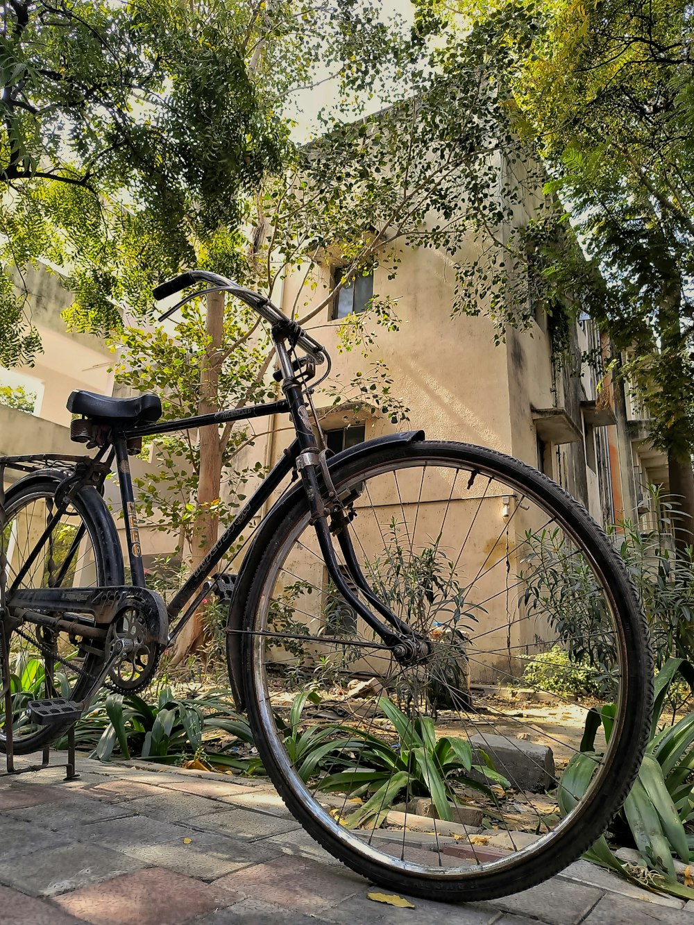 a bicycle parked on the side of the road