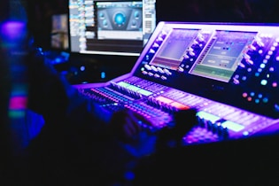a laptop computer sitting on top of a desk