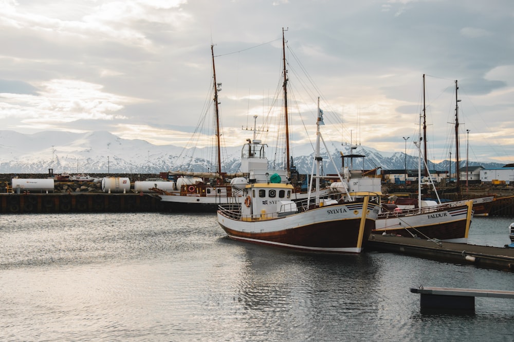 a couple of boats that are sitting in the water