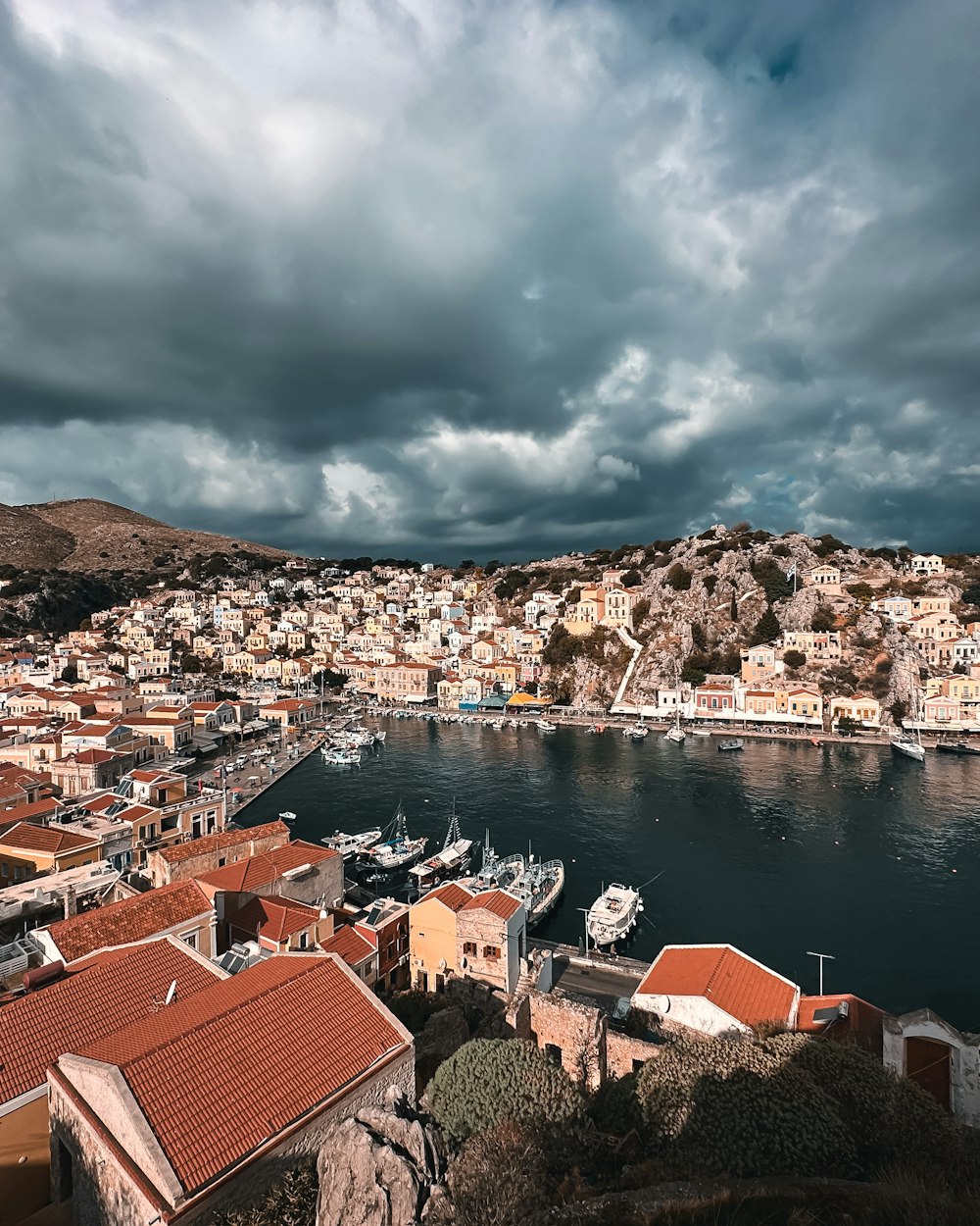 a view of a harbor with boats in the water