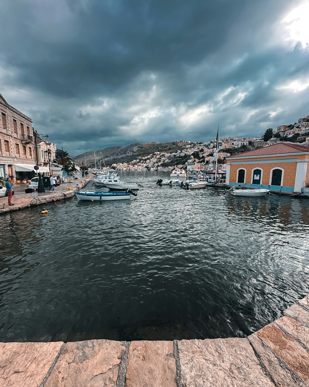 a body of water with a bunch of boats in it