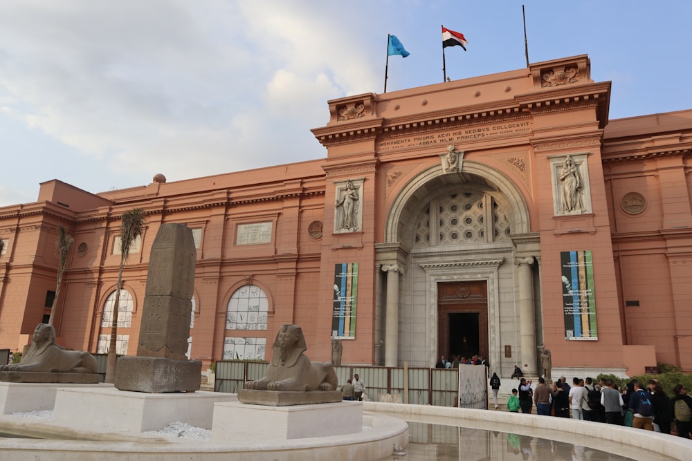 a group of people standing in front of a building