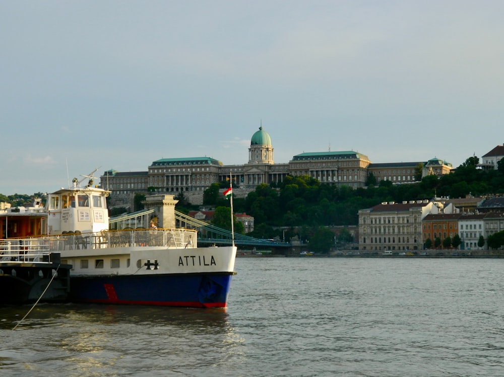 a large boat floating on top of a body of water