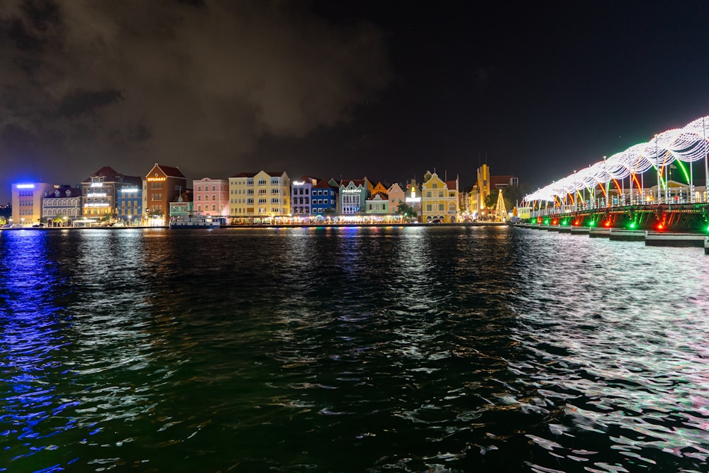 a bridge over a body of water at night