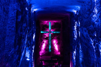 a church with a cross in the middle of it