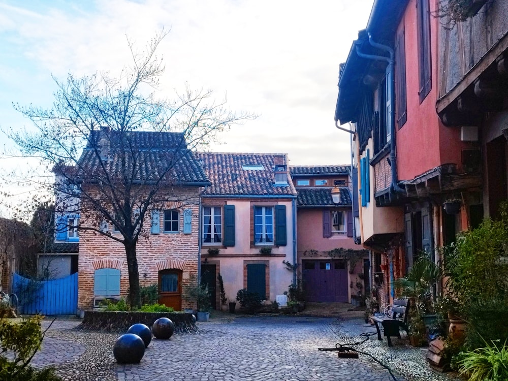 a cobblestone street in a european village