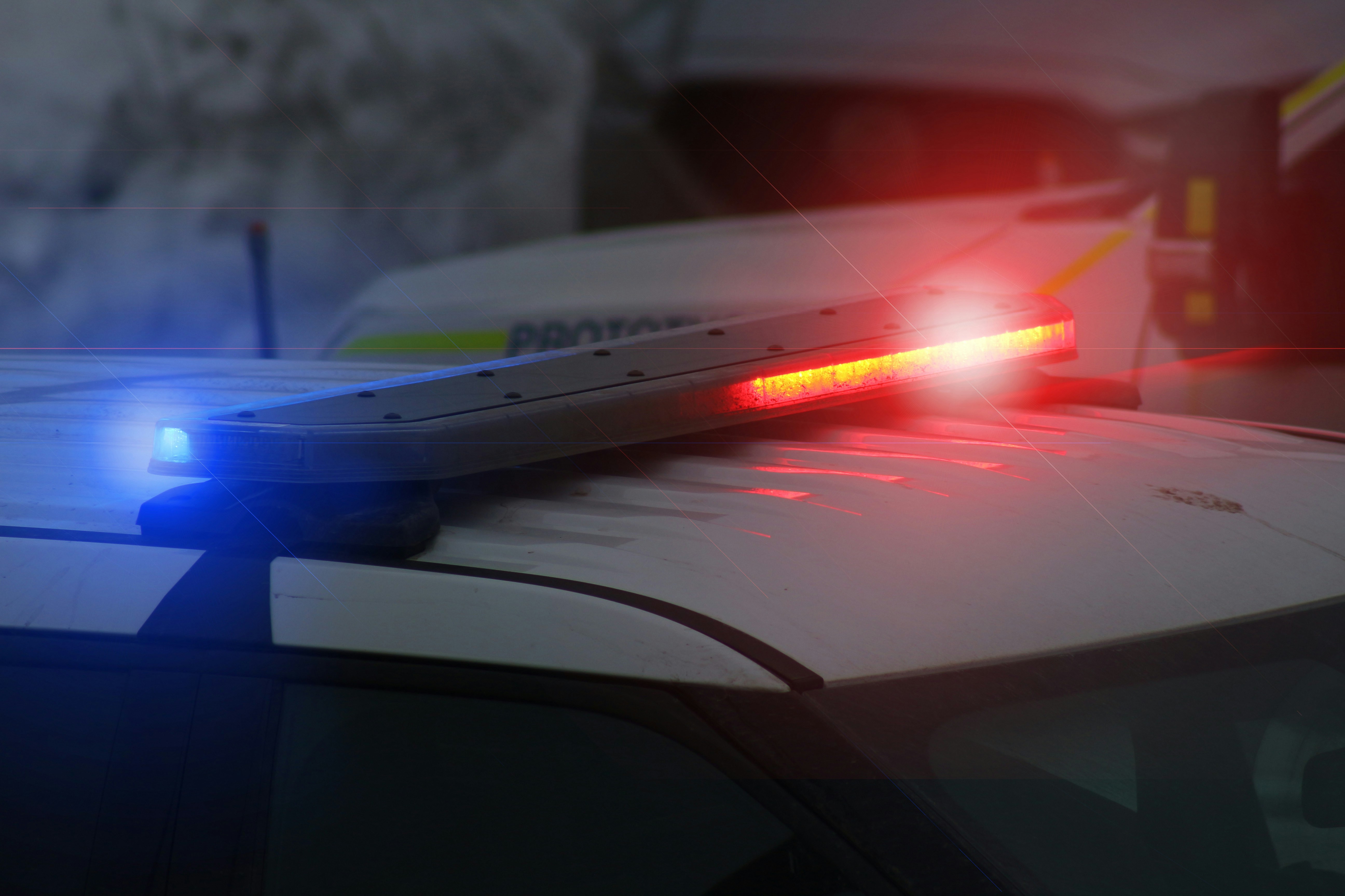 a close up of a police car with its lights on