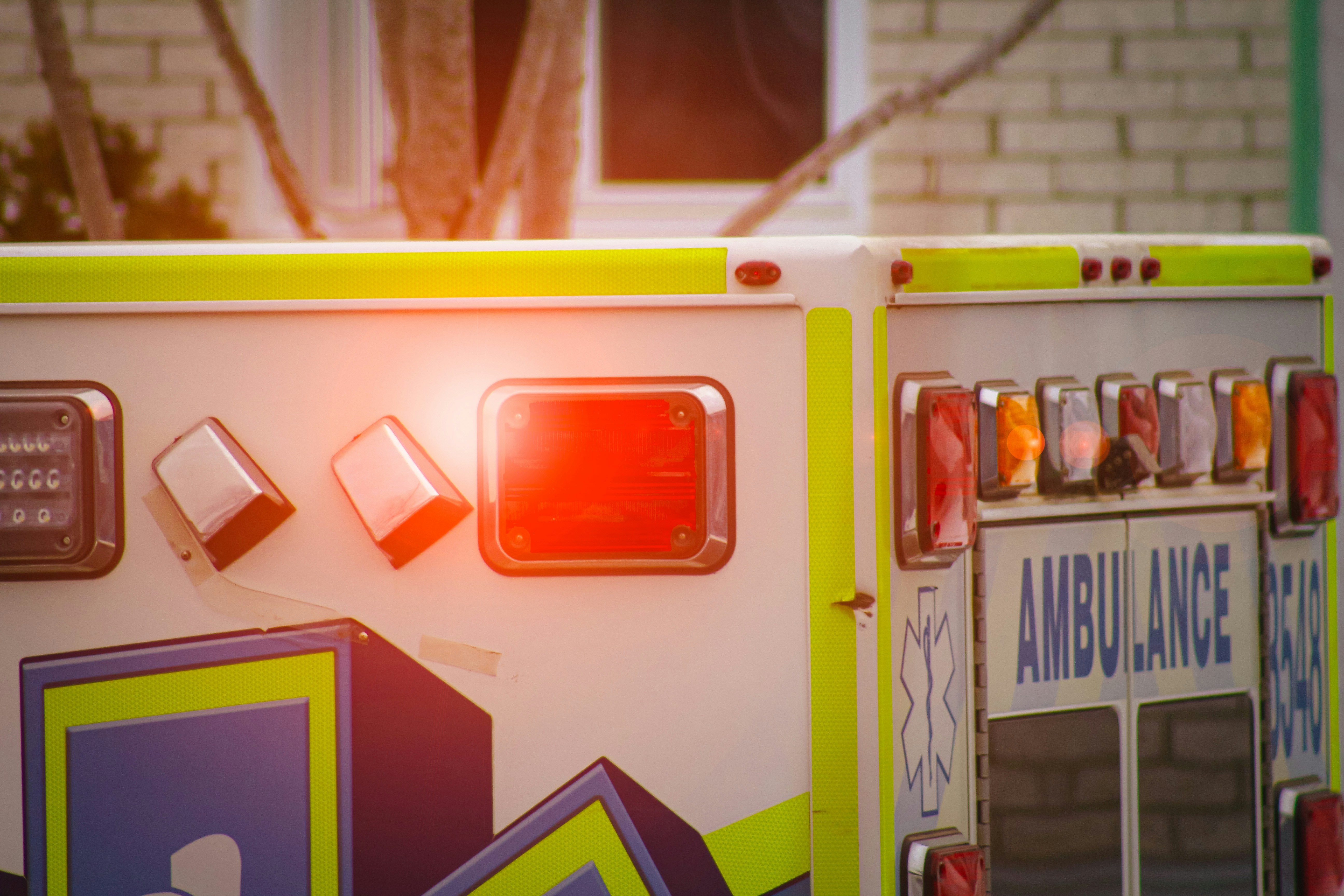 a close up of a fire truck with its lights on