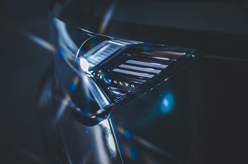 a close up of a metal object with a blurry background