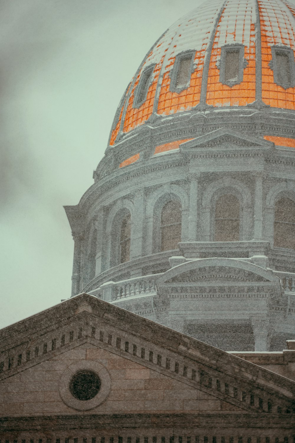 the dome of a building with a clock on it