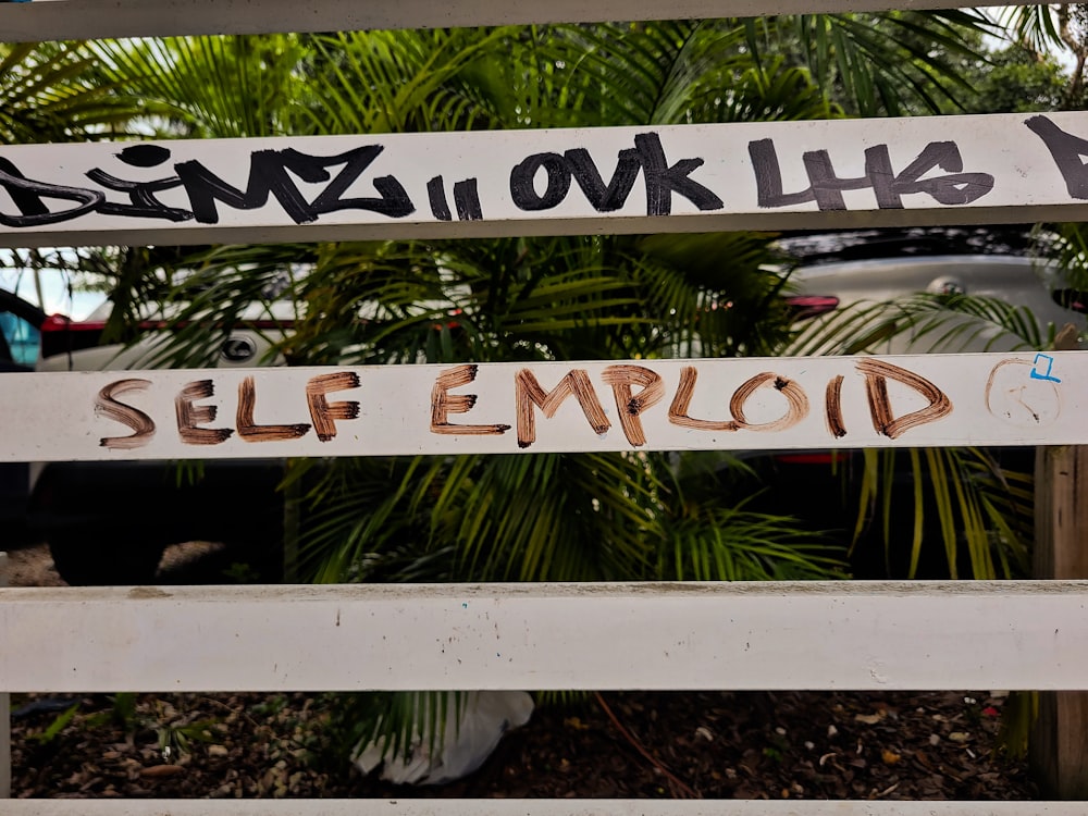 a sign that says self emploid on it
