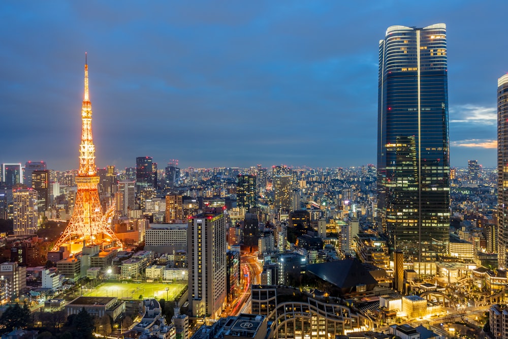 a view of a city at night from the top of a building