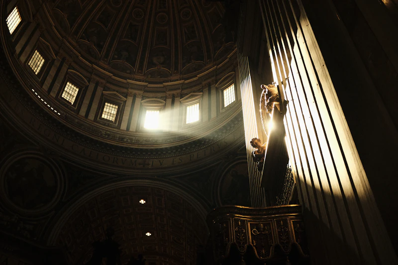 Warm light streaming through the windows of a cathedral
