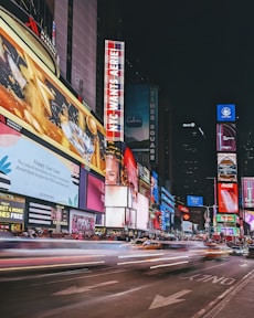 a city street filled with lots of tall buildings