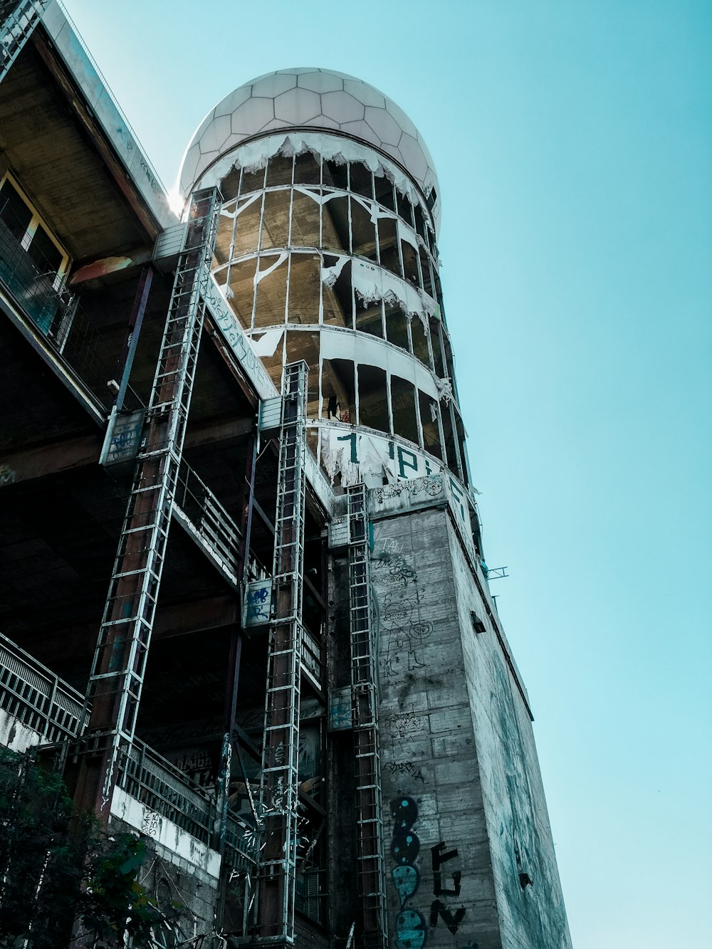 a tall building with scaffolding on the side of it