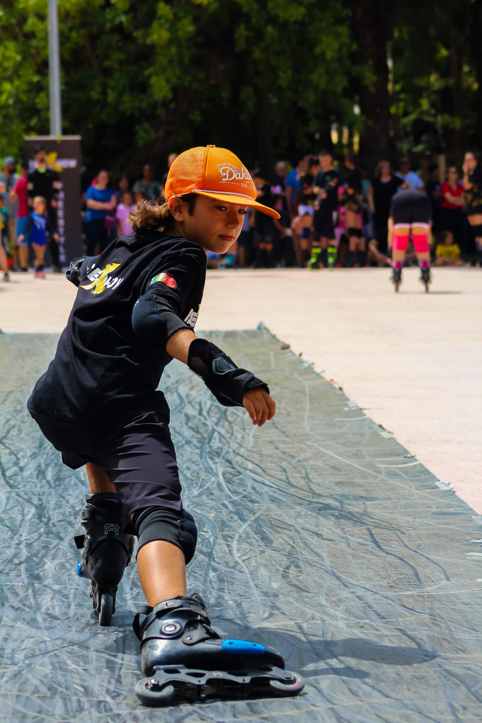 Rollerblader carving a ramp