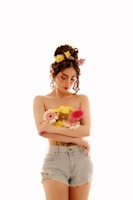 a woman with a bunch of flowers in her hair