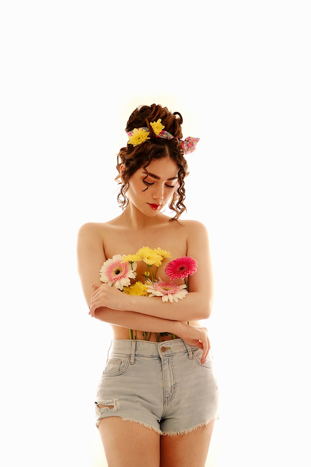 a woman with a bunch of flowers in her hair