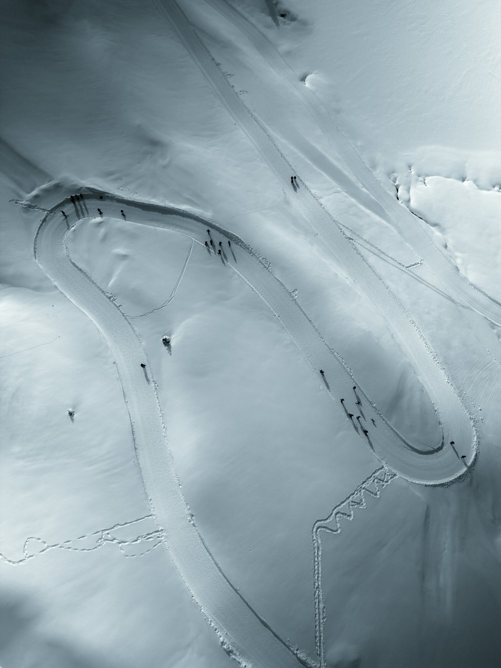 an aerial view of a snow covered ski slope