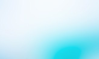a blurry image of a blue and white background