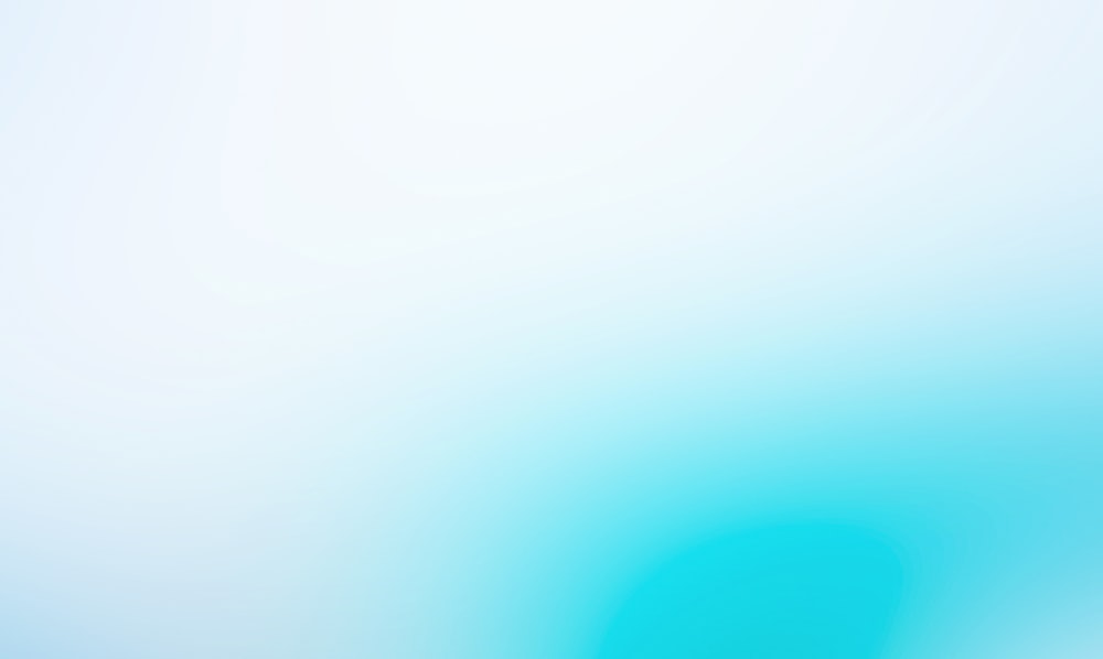 a blurry image of a blue and white background