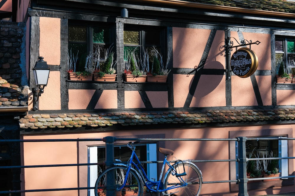 a bike is parked outside of a building