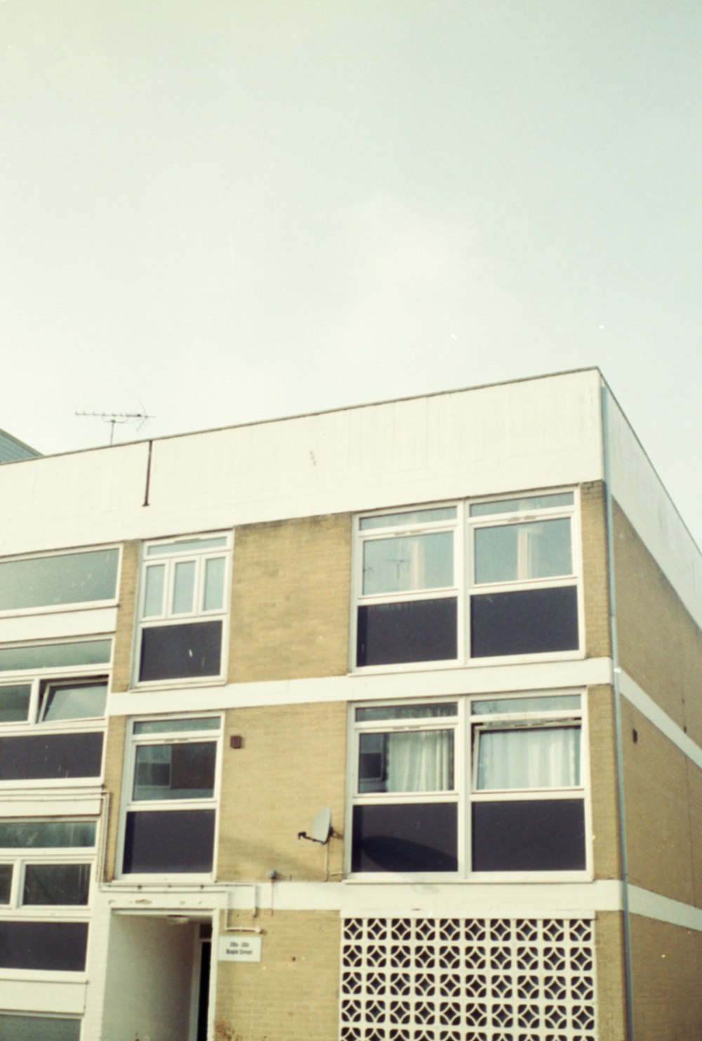 a tall building with lots of windows on the side of it