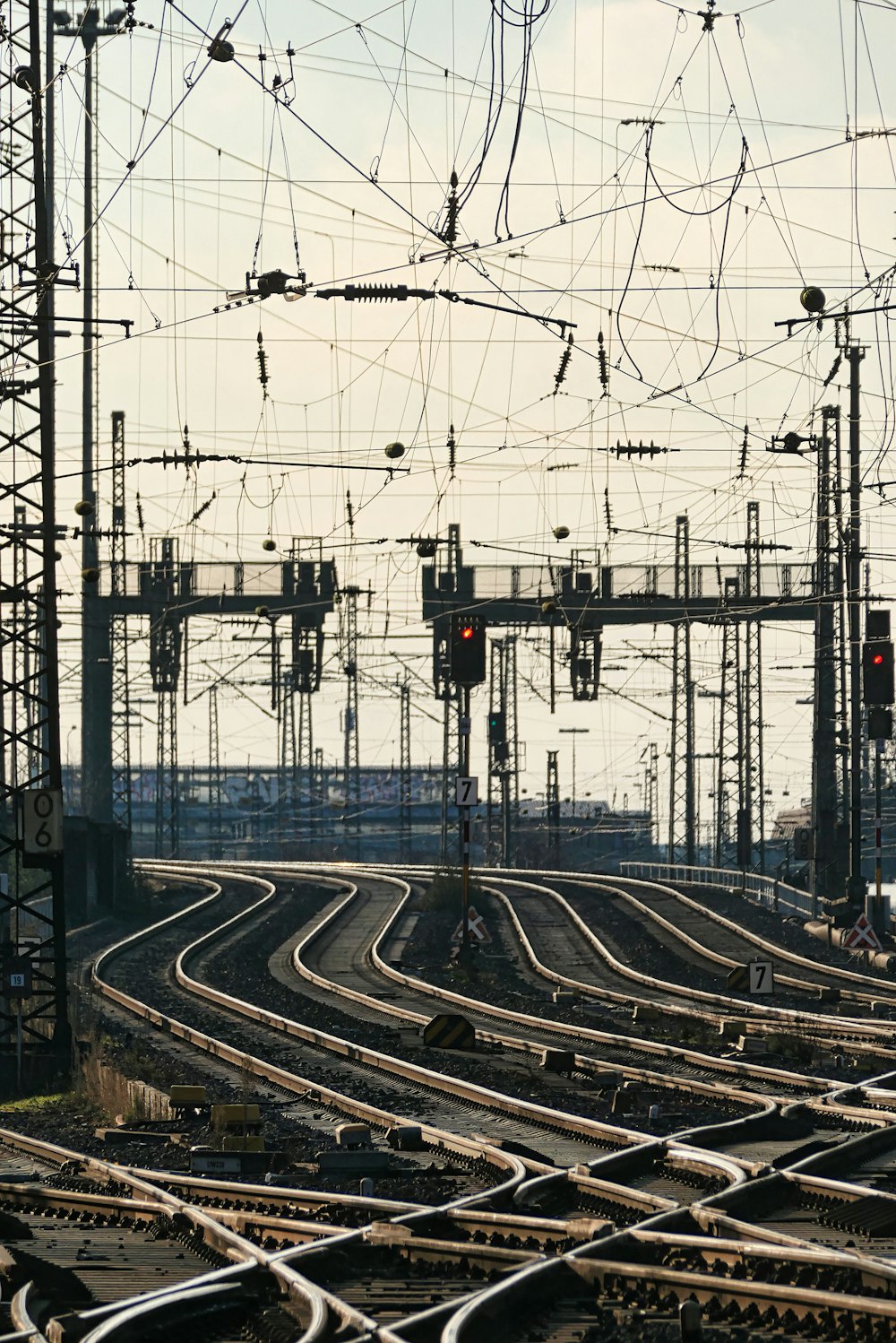 a train yard filled with lots of train tracks