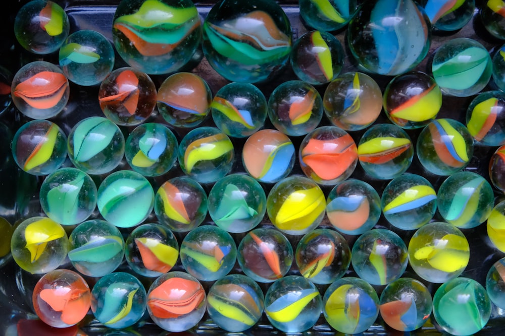 a bunch of marbles that are sitting on a table