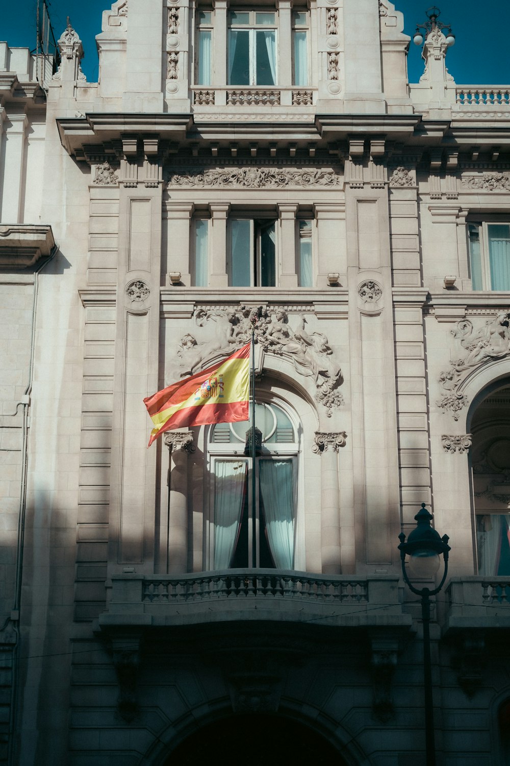 a large building with a flag on top of it