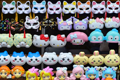 a bunch of different kinds of masks on display