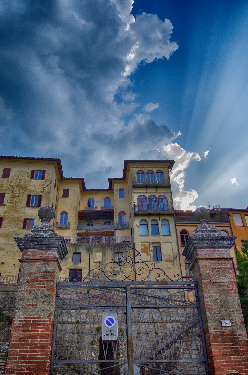 a large building with a gate in front of it