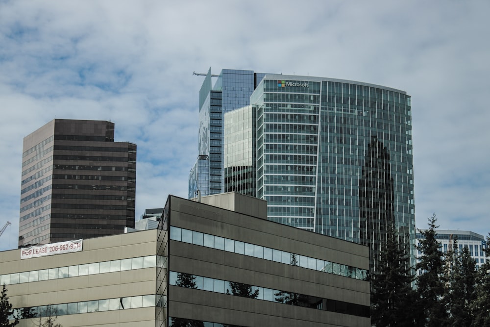 a view of some very tall buildings in a city