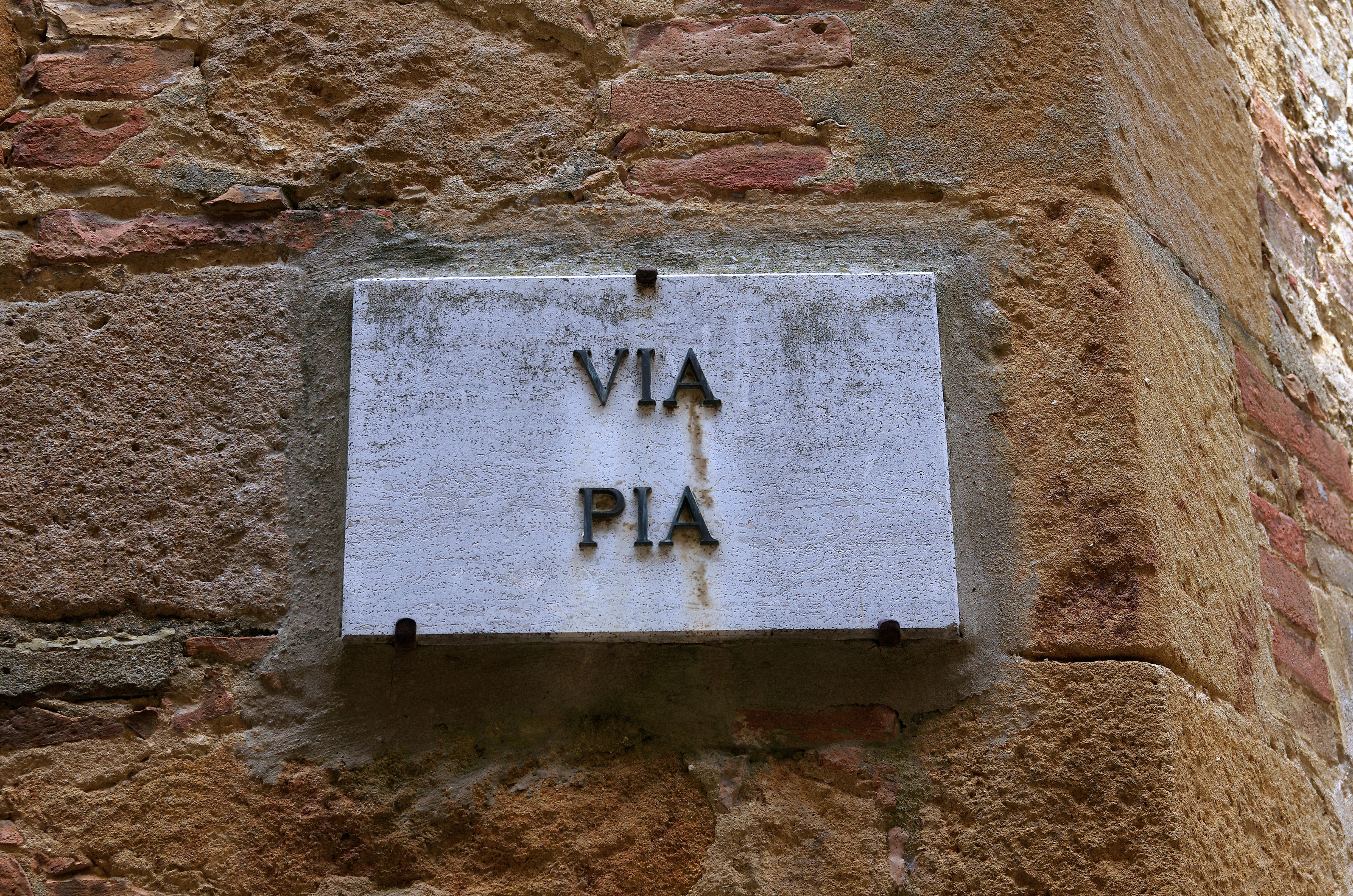 a sign that is on the side of a building