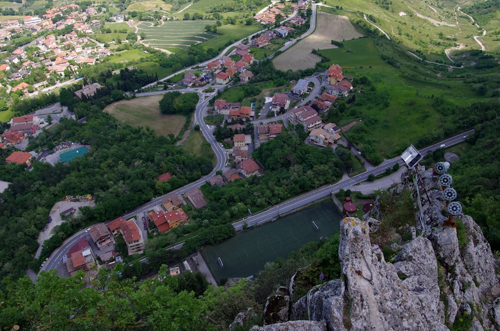 an aerial view of a town and a river