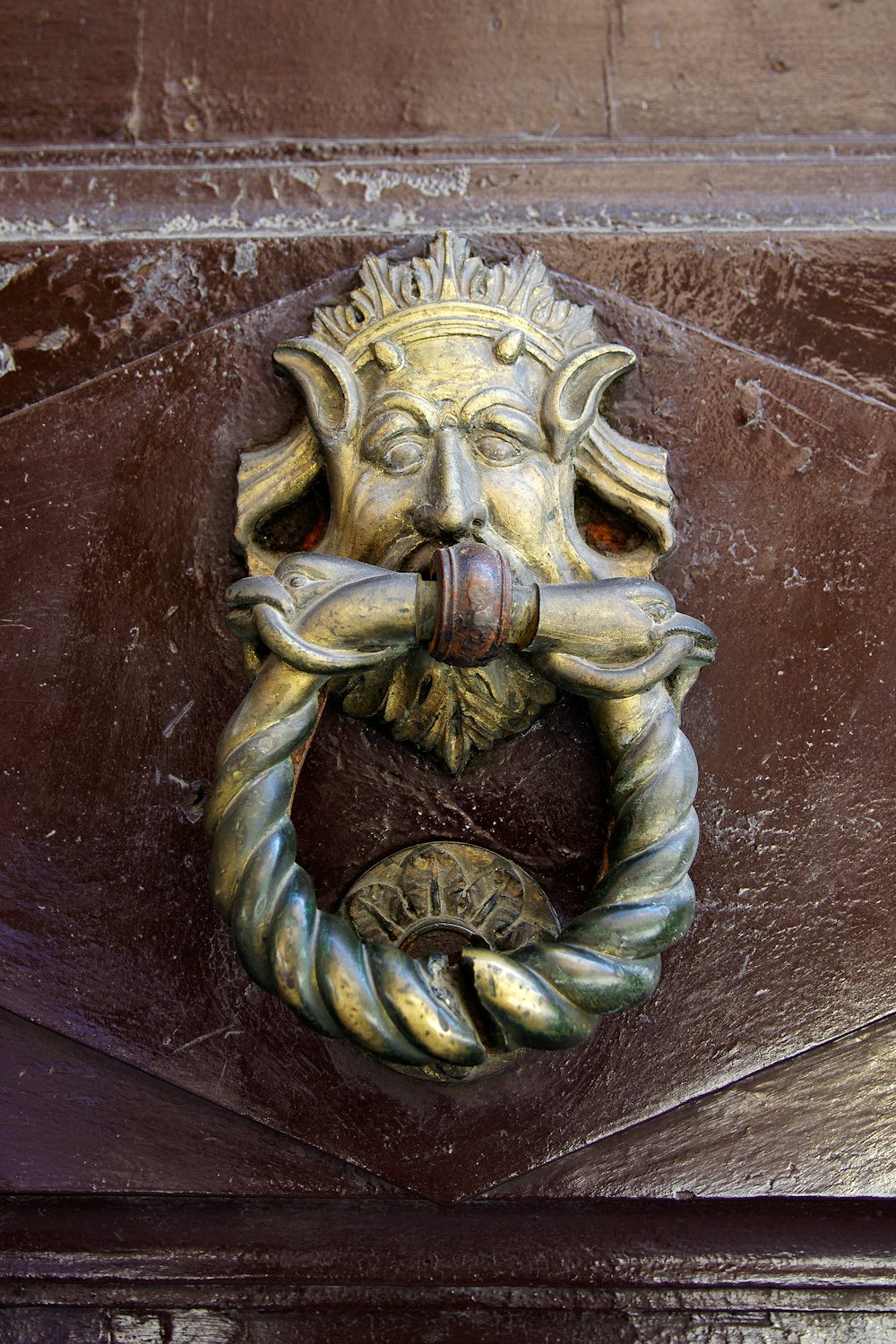 a close up of a door handle on a door