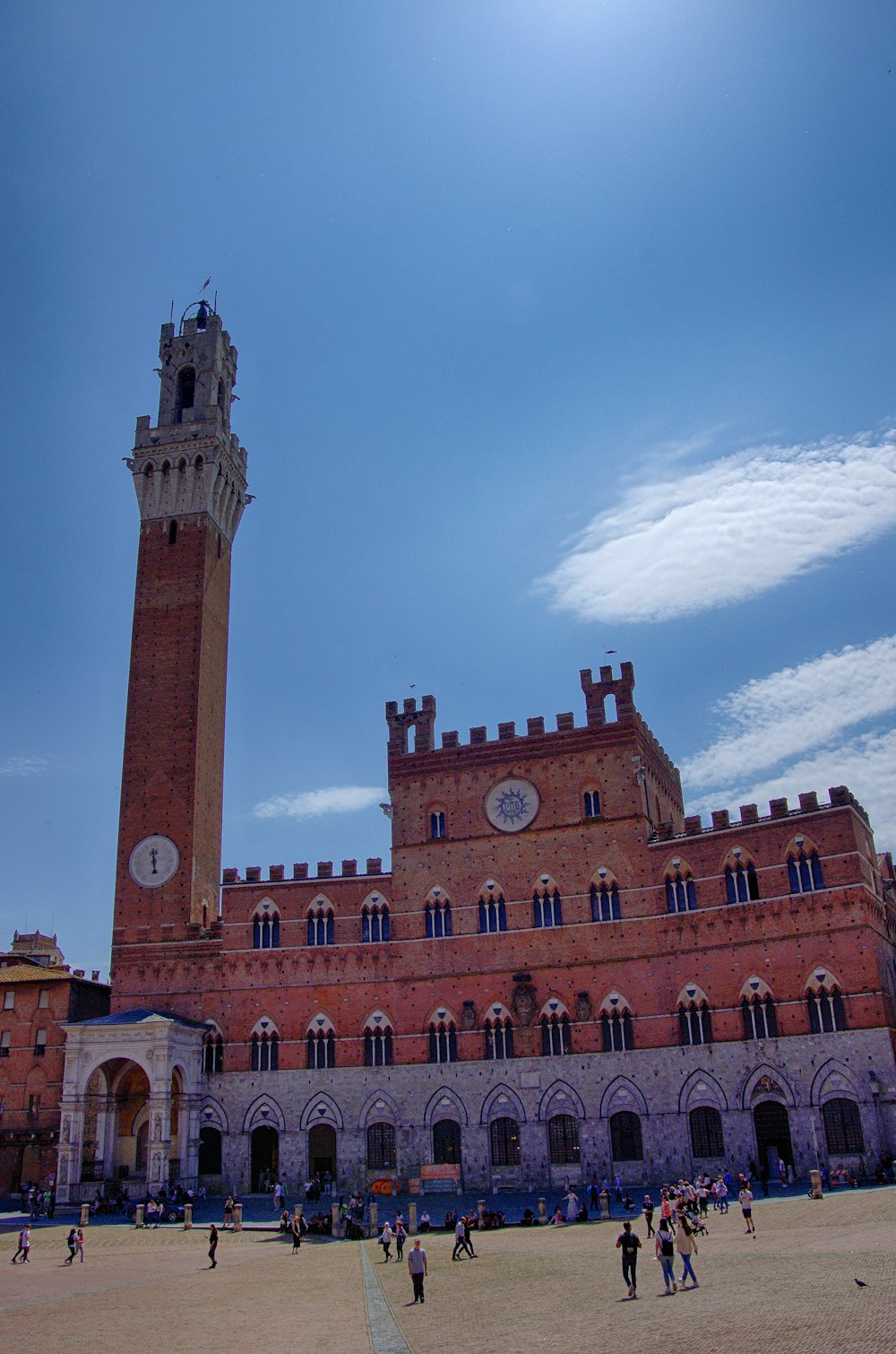 a large brick building with a clock tower