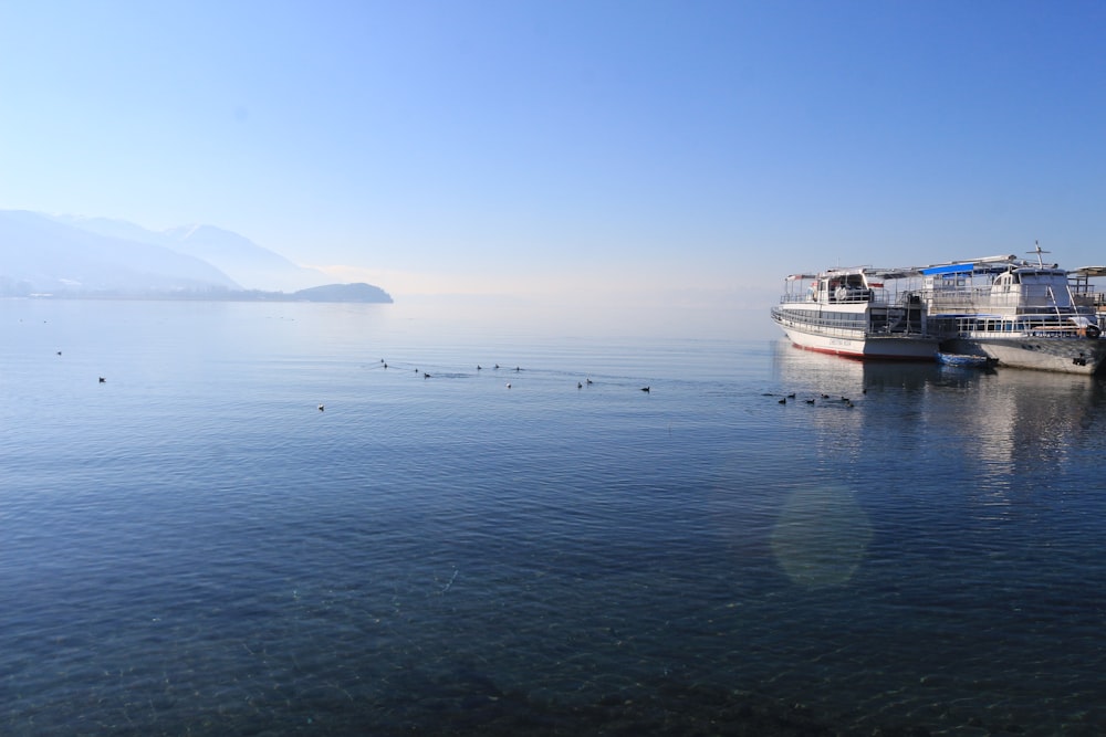 a couple of boats that are sitting in the water