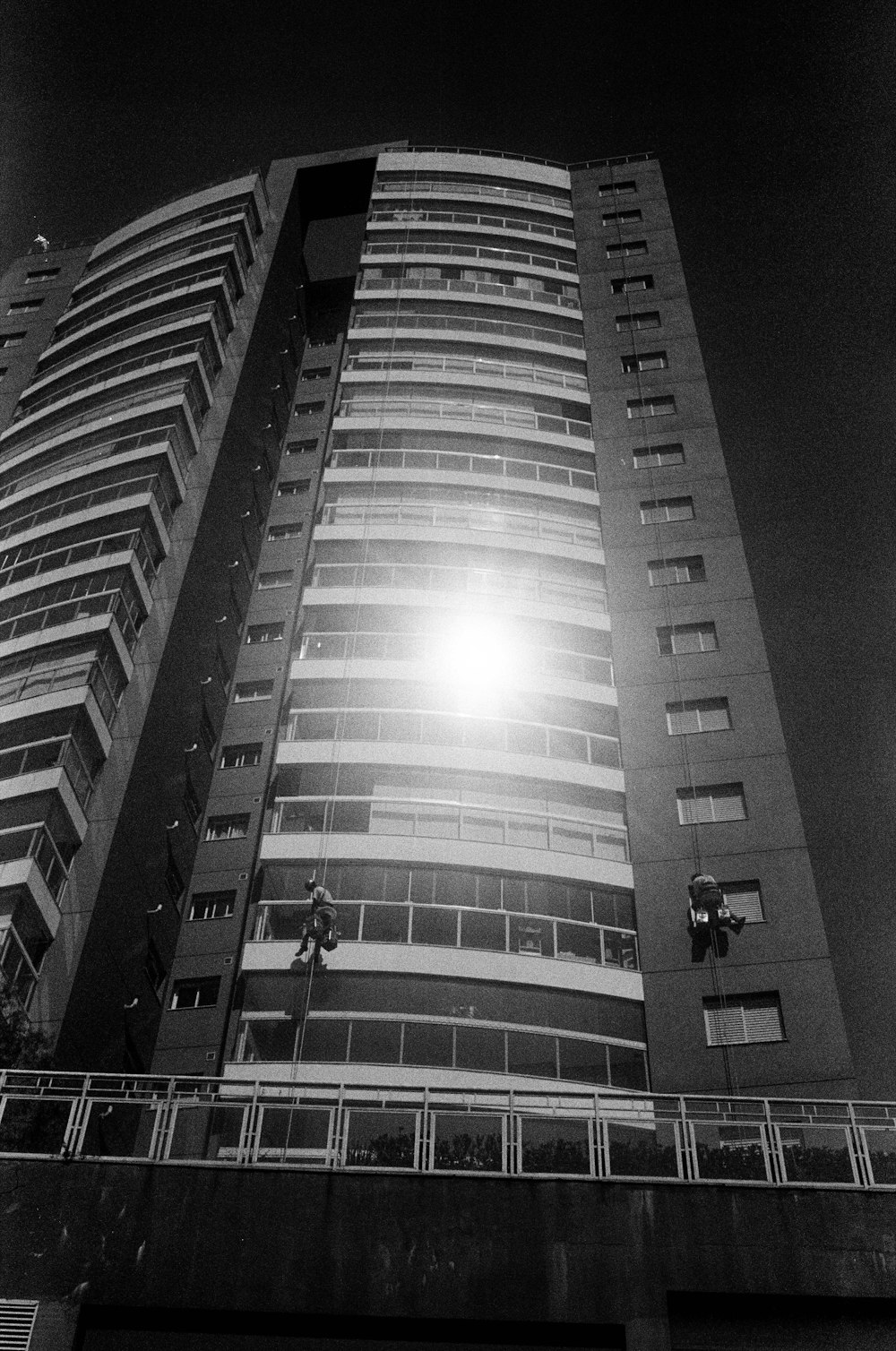 a black and white photo of a tall building