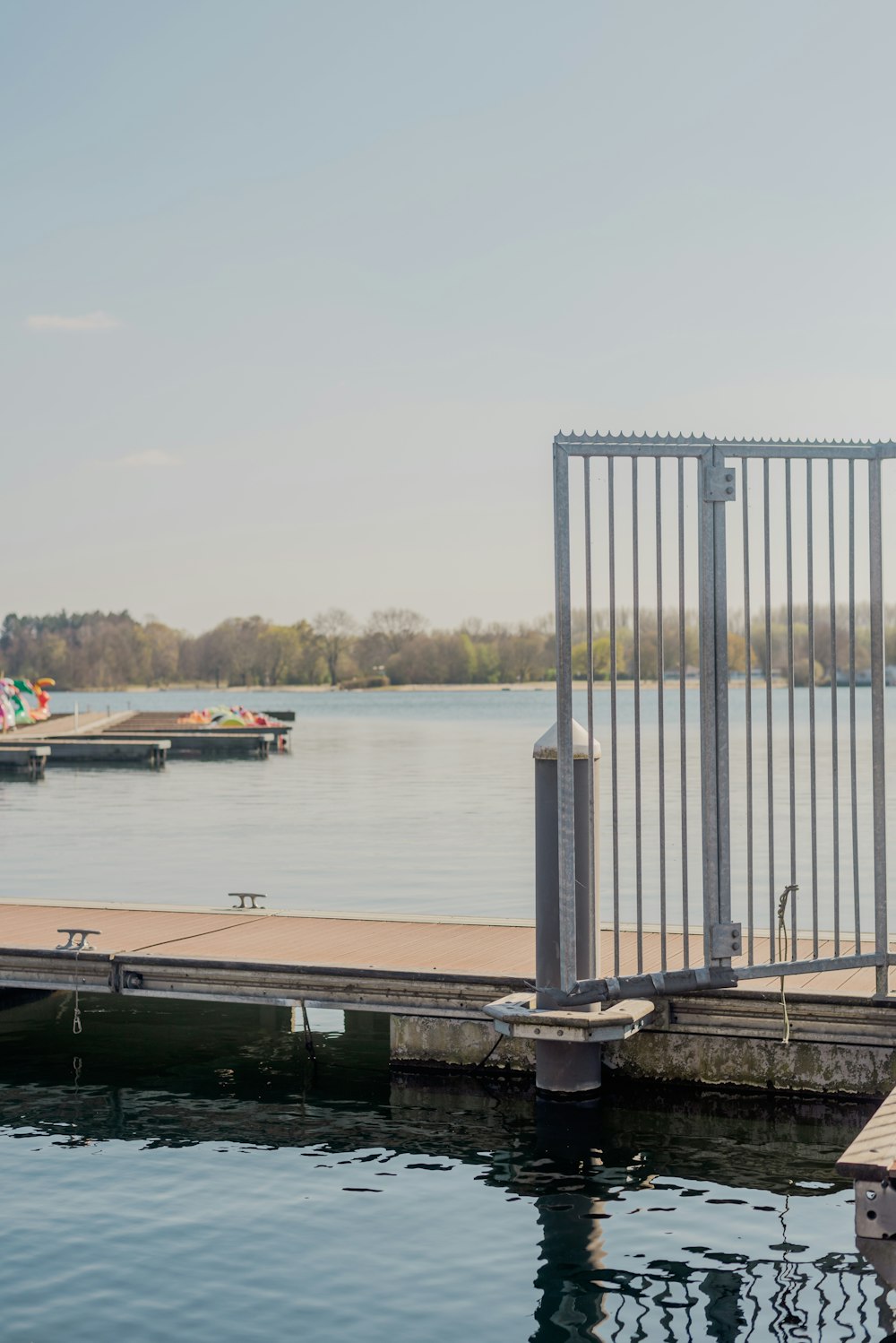 a dock with a boat in the water