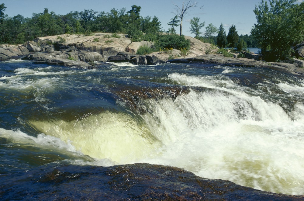 a large body of water surrounded by rocks