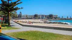 a view of a beach from a car window
