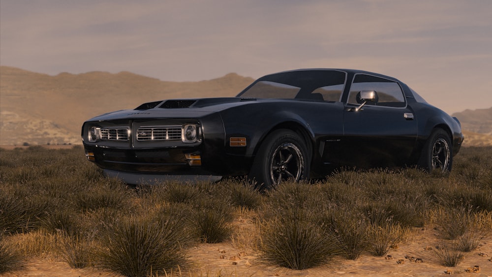 a black car is parked in the desert