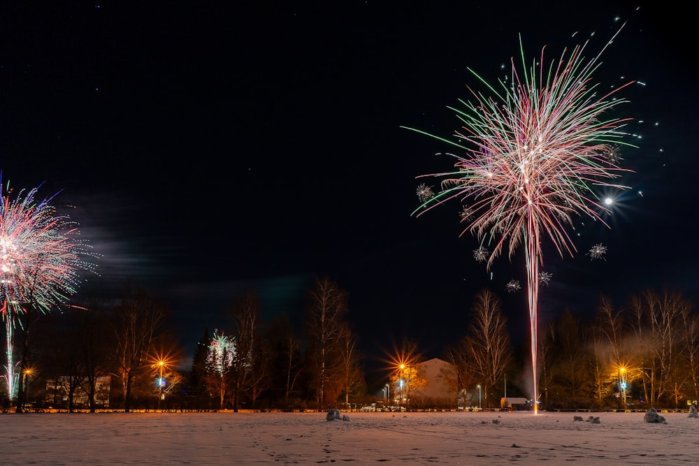 fireworks are lit up in the night sky