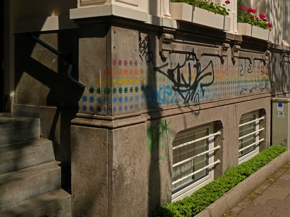 a building with graffiti on the side of it