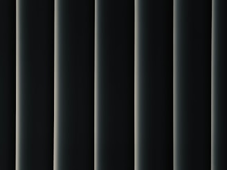 a black and white photo of a curtain