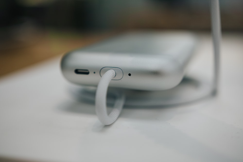 a close up of a cell phone on a table