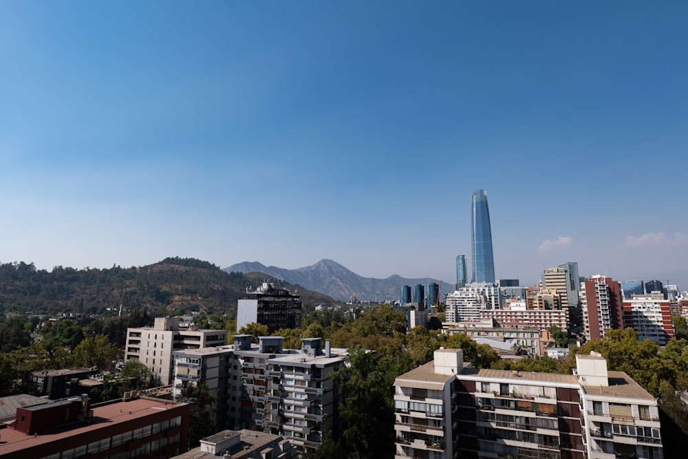 a view of a city with mountains in the background