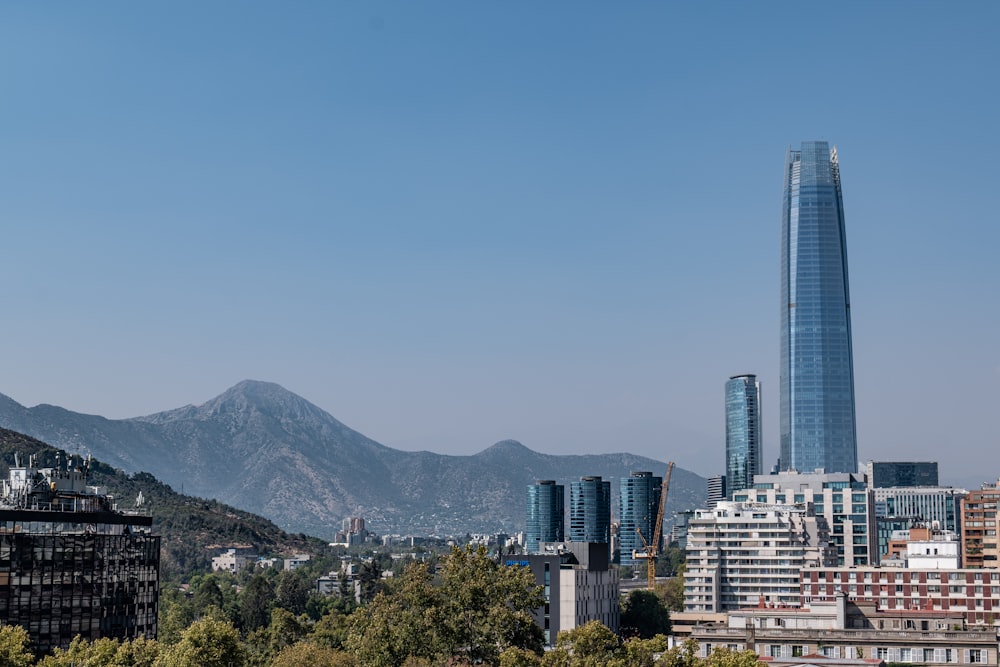 a view of a city with mountains in the background