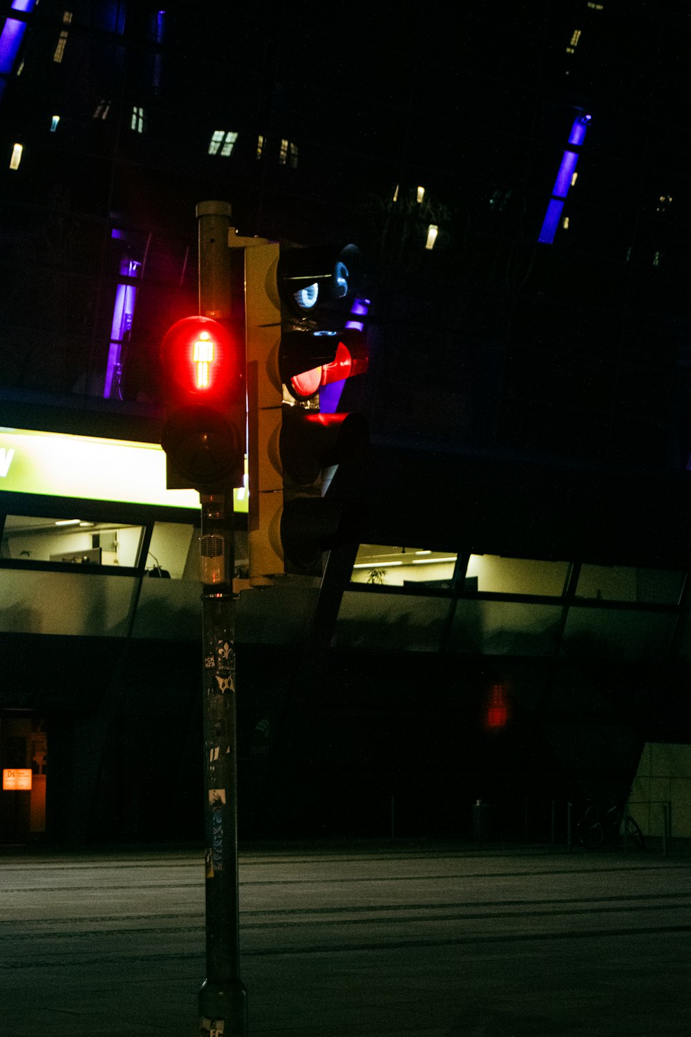 a traffic light sitting on the side of a road